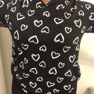 black shirt with white hearts